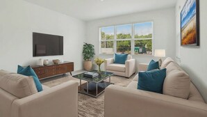 A modern living room with a flat-screen TV, two sofas, a coffee table, a cabinet, and a window with blinds. - Kissimmee Oasis 4BR House Pool & Sleeps 8 (Kissimmee)