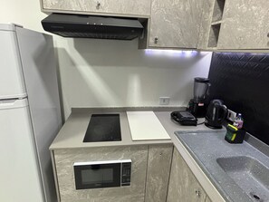 Private kitchen - Ravello Residencial – Comfort and tranquility in Foz do Iguaçu (Foz do Iguaçu)