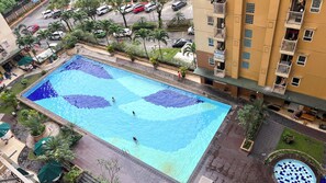 Outdoor pool - Neat Studio Apartment At Green Palm Residence (Jakarta)
