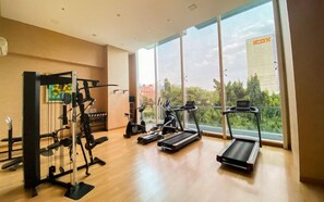 Fitness facility - Chic And Warm Studio With Super King Bed At Capitol Suites Apartment (Jakarta)