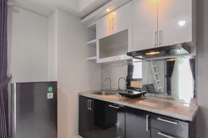 Private kitchen - Spacious And Cozy 2Br At Tamansari Prospero Sidoarjo Apartment (Sidoarjo)