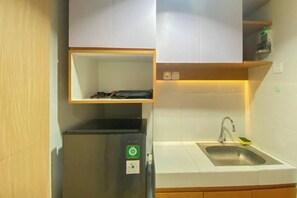 Standard Apartment | Private kitchen - Neat 1Br Studio At The Alton Apartment (Semarang)