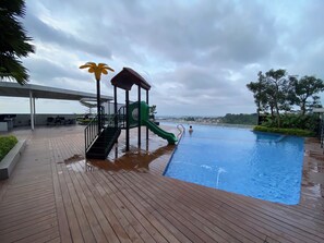 Outdoor pool - Minimalist And Enjoy Living Studio Amartha View Apartment (Semarang)