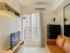 Standard Apartment | Living area - Practical 2Br For 4 Pax At Podomoro Golf View Apartment (Gunung Putri)