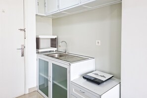 Interior - Comfy White Studio At Poris 88 Apartment (Tangerang)
