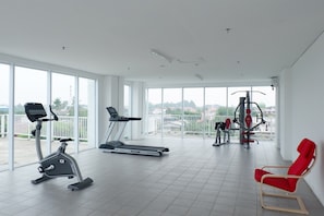 Fitness facility - Comfy White Studio At Poris 88 Apartment (Tangerang)