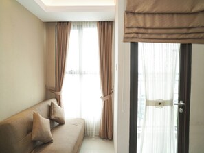 Standard Studio | Living room - Neat And Restful Studio For 2 Pax At Transpark Bintaro Apartment (Tangerang)
