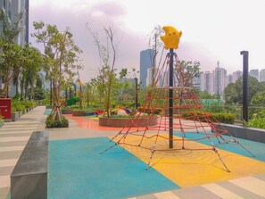 Children’s play area – outdoor - Chic And Roomy 2Br Space At Apartment Casa Grande Residence (Jakarta)