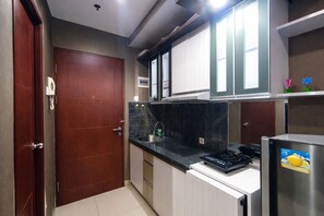 Standard Studio | Private kitchen - Great Choice Studio At Taman Melati Jatinangor Apartment (Hegarmanah)