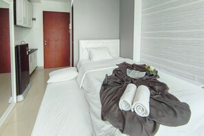 Interior - Comfortable Gray Studio Room At Apartment Taman Melati Jatinangor (Hegarmanah)