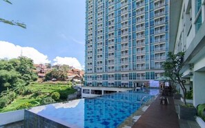 Outdoor pool - Comfortable Gray Studio Room At Apartment Taman Melati Jatinangor (Hegarmanah)