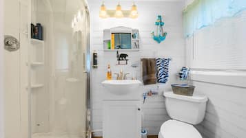 Hair dryer, towels, soap, shampoo