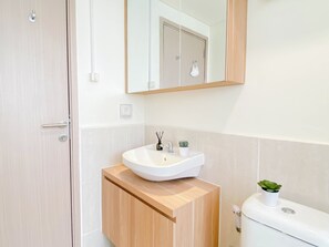 Standard Apartment | Bathroom - Cozy And Roomy 3Br At Apartment Meikarta District 1 (Cikarang)