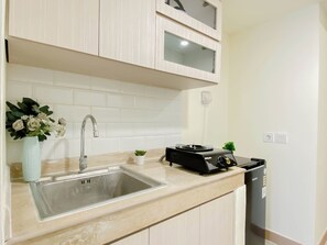 Standard Apartment | Private kitchen | Electric kettle - Serene Beige 2Br Space At Apartment Meikarta District 1 (Cikarang)