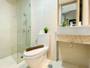 Standard Studio | Bathroom - Serene And Warm Studio Room At Apartment Gold Coast Pik (Jakarta)