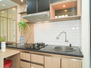 Standard Apartment | Private kitchen - Warm 2Br For 3 Pax At Bassura City Apartment Near Shopping Center (Jakarta)