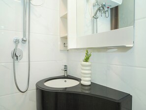 Standard Studio | Bathroom - Chic And Comfortable Studio Room At Apartment Sky House Bsd (Pagedangan)
