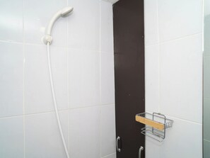 Standard Studio | Bathroom - Chic Green Studio Room At Apartment Tokyo Riverside Pik 2 (Teluknaga)