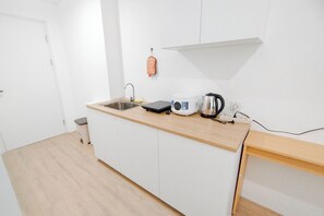 Standard Studio | Private kitchen - Japanese Style Studio At Kyo Society Apartment (Surabaya)