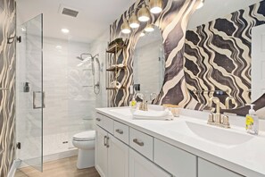 Hair dryer, towels, soap, toilet paper