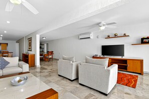 Apartment, Multiple Beds, Pool Access, Ocean View (Grand Miramar A302) | Living area - Upscale Bayview Villa With hot Tub, Private Terrace, Pool & Stylish Interiors (Puerto Vallarta)