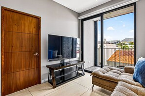 Condo, Multiple Beds, Pool Access, City View (Susurro del Agua) | Living area - Modern Condo With Rooftop Pool, Balcony, gas Grill & gym Access (Puerto Vallarta)