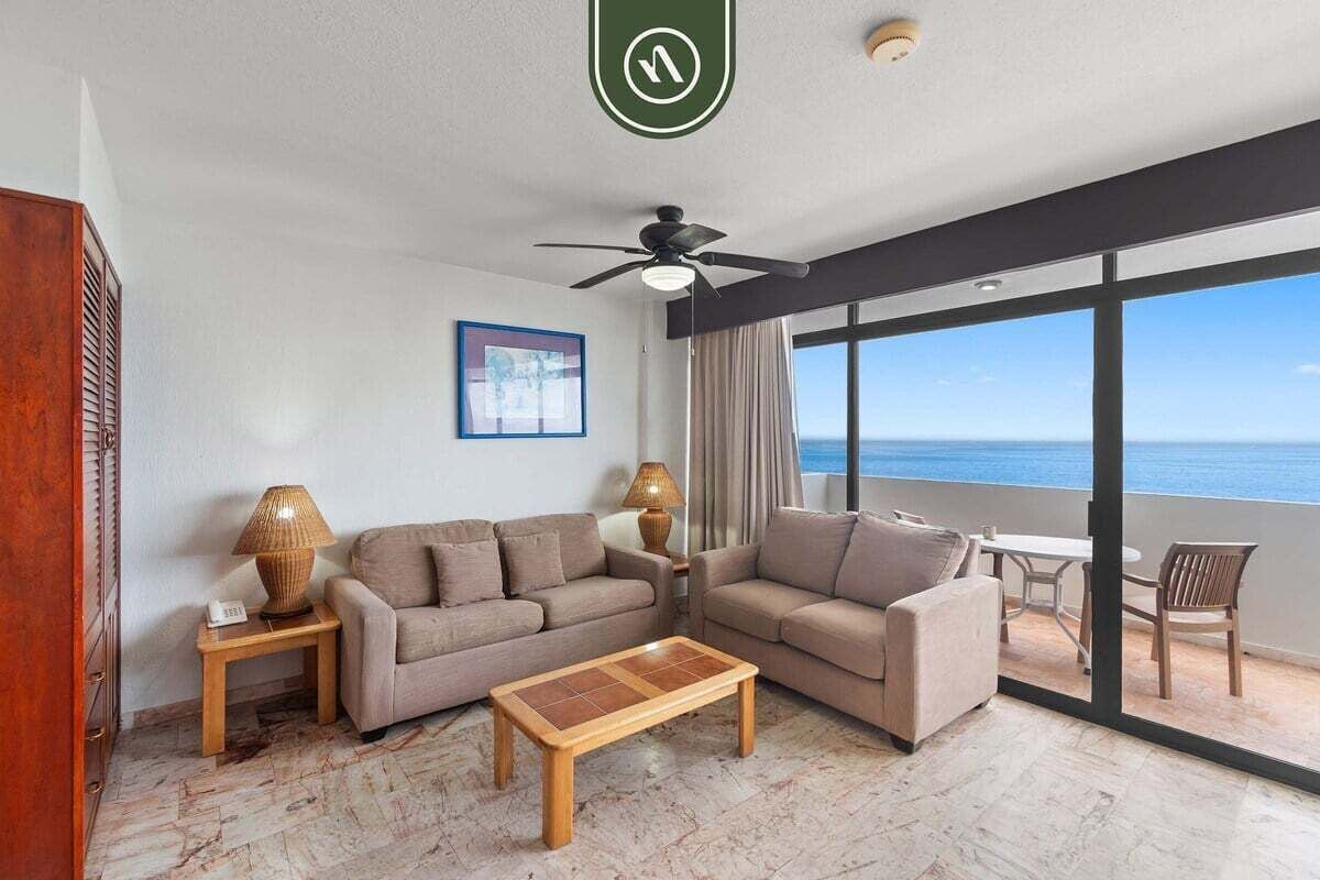 公寓式客房, 1 张特大床和 1 张沙发床, 阳台, 海洋景观 (Costa Sur Suite 2) | 起居区