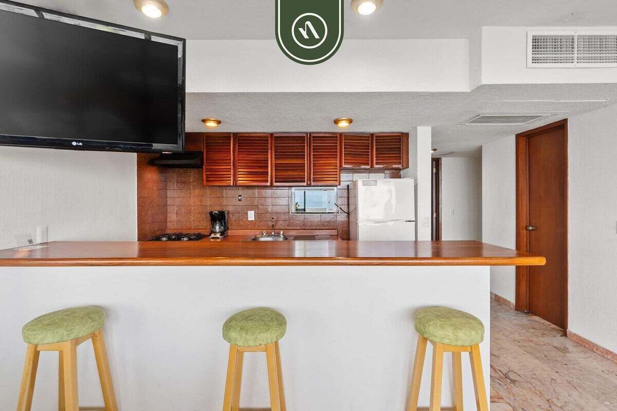 Condo, 1 cama King size y sofá cama, balcón, vista al océano (Costa Sur Suite 2) | Cocina privada