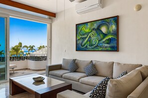 Apartment, Multiple Beds, Pool Access, Ocean View (Grand Miramar APB1) | Living area - Stylish Suite With Wifi, hot Tub, gym Access, Heated Pool & Terraces (Puerto Vallarta)