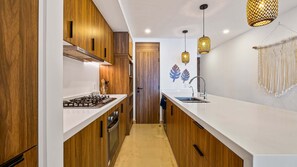 Private kitchen - Bright Oceanfront Condo With Balcony, Rooftop Pool & Near Malecon Boardwalk (Puerto Vallarta)