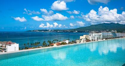 Modern Waterfront Condo With Shared Pool, Balcony, and Washer/dryer