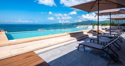 Modern Waterfront Condo With Shared Pool, Balcony, and Washer/dryer