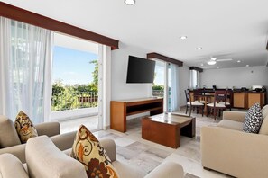 Apartment, Multiple Beds, Pool Access, Partial Ocean View (Grand Miramar B103) | Living area - Luxurious Partial Ocean-view Suite With 3 Pools, hot Tub, gym & Balcony (Puerto Vallarta)