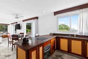 Apartment, Multiple Beds, Pool Access, Beach View (Grand Miramar B203) | Private kitchen - Spacious Suite With Wraparound Terrace, Rooftop Infinity Pool & Resort Amenities (Puerto Vallarta)