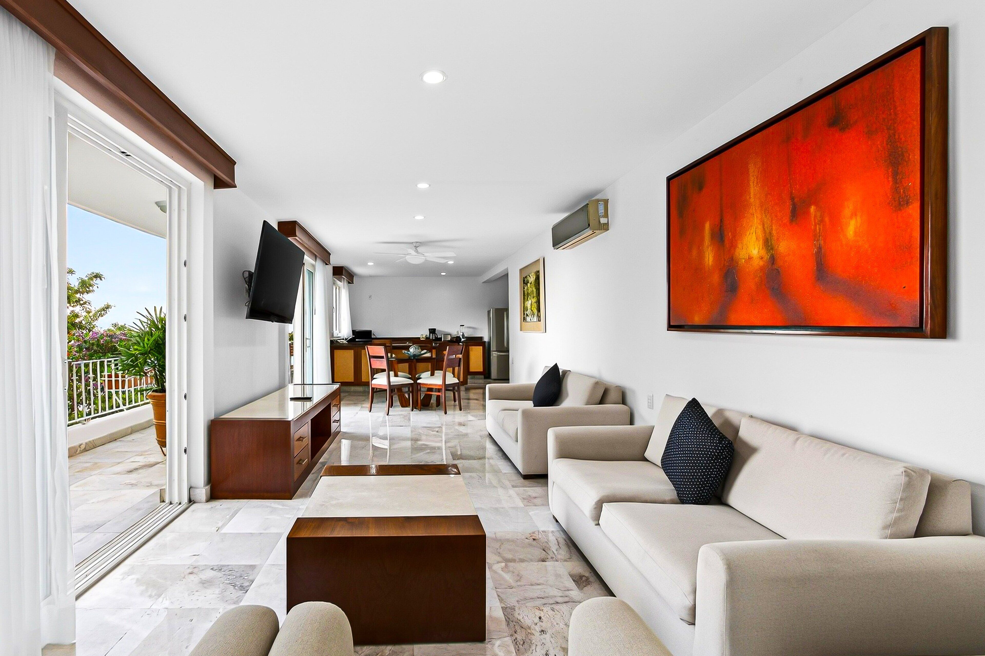 Departamento, varias camas, acceso a la alberca, vista a la playa (Grand Miramar B203) | Área de sala de estar