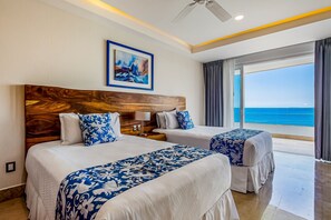 Apartment, Multiple Beds, Balcony, Ocean View (Blue Horizon 804 at Residences) | 2 bedrooms, individually decorated, individually furnished, bed sheets - Luxe 8th-floor Condo With Endless Ocean Views, Pool, spa & Balcony (Puerto Vallarta)