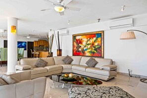 House, Multiple Beds, Pool Access, Ocean View (Grand Miramar APH2) | Living area - Elegant Multi-level Penthouse With Rooftop Jacuzzi, bay Views, Pool & Game Room (Puerto Vallarta)