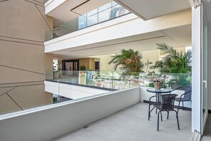 Condo, 1 King Bed with Sofa bed, Balcony, City View (V Golf 601) | Outdoor dining - Enchanting & Modern Beach Retreat With Pool, Gym, & Breathtaking Balcony Views (Puerto Vallarta)
