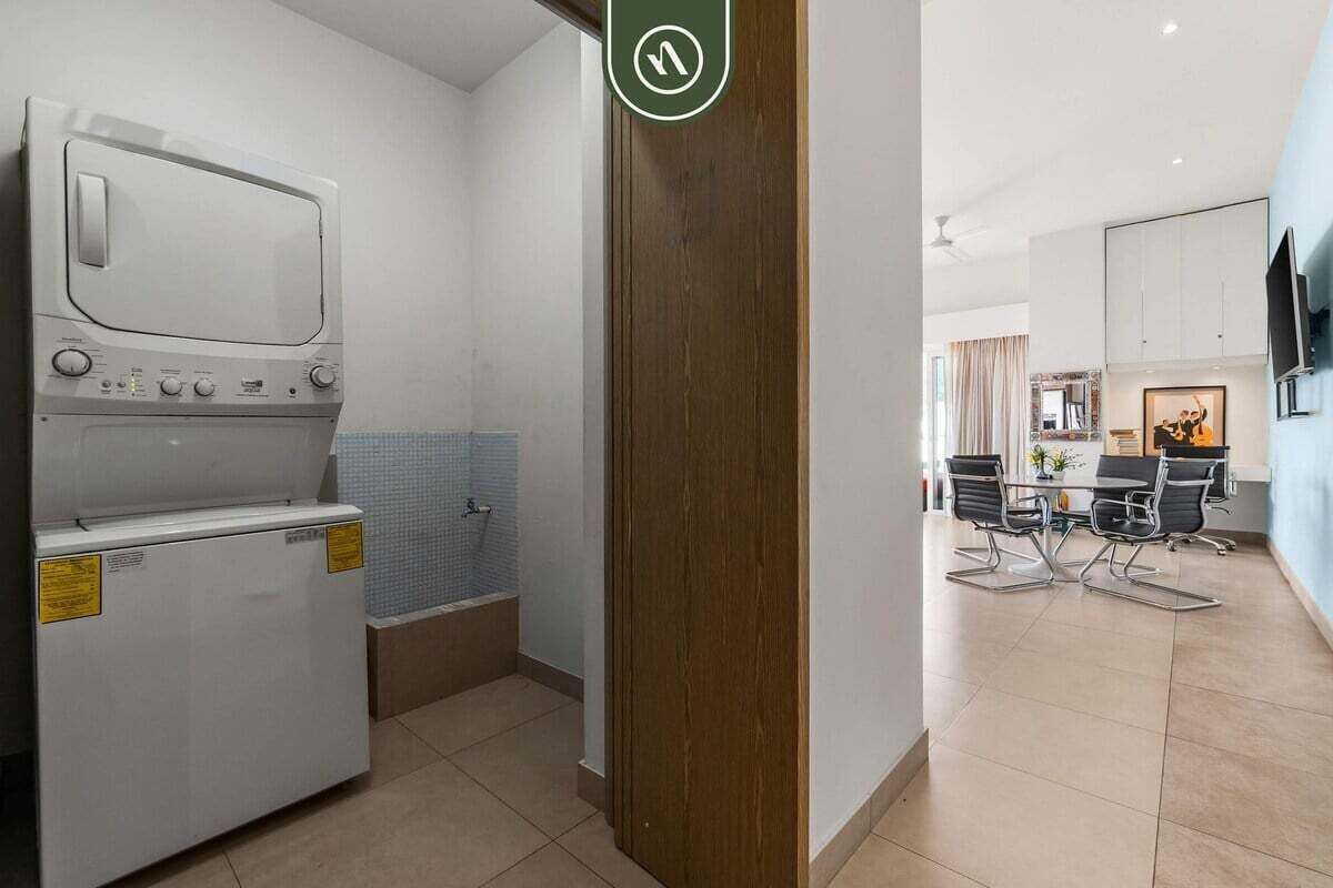 Apartment, Multiple Beds, Jetted Tub, Pool View (Zenith 702) | Laundry
