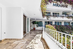 Apartment, Multiple Beds, Pool Access, Partial Ocean View (Grand Miramar B104) | Exterior detail - Cozy Condo With Pool & AC - Family Base Near Beach & Activities, Shared hot tub (Puerto Vallarta)