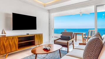 Departamento, 1 cama King size, balcón, vista al océano (Blue Horizon 202 at Residences) | Área de sala de estar