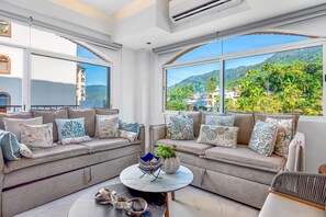 Condo, Multiple Beds, Balcony, Ocean View (Playas Gemelas Framboyan 803A) | Living area - Charming Beach Apartment With Pool and Beach Access, Full Kitchen and Wifi (Puerto Vallarta)