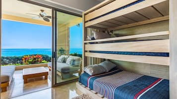 Departamento, varias camas, acceso a la alberca, vista a la playa (Coastal Charm at Garza Blanca) | 2 habitaciones, decoración personalizada y muebles diferentes