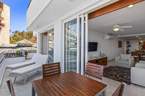 Apartment, Multiple Beds, Pool Access, Ocean View (Grand Miramar A601) | Outdoor dining - Elegant Bayview Suite With Terrace Access, Full Kitchen, Pool, hot tub & gym (Puerto Vallarta)
