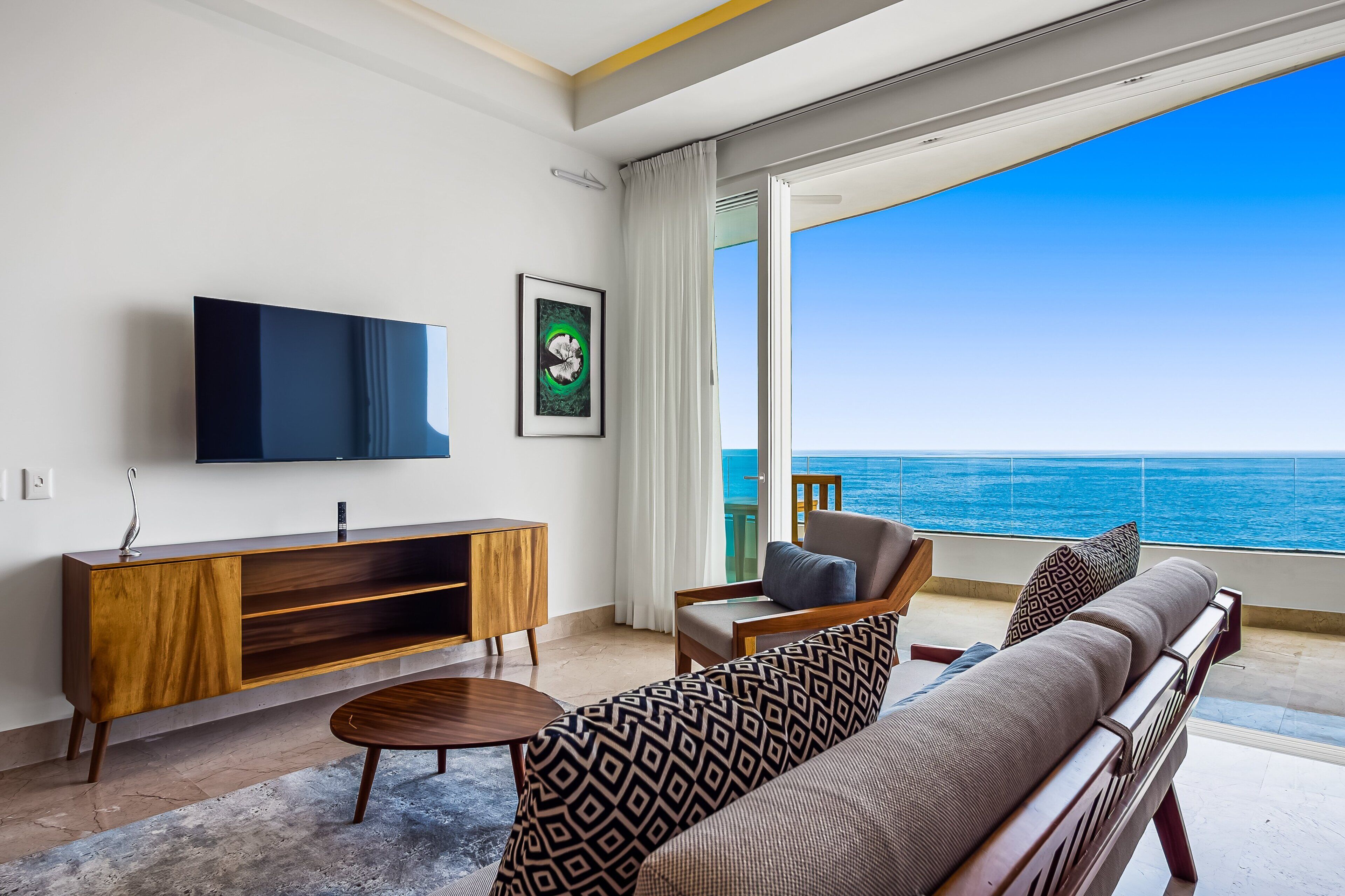 Condo, 1 cama King size, acceso a la alberca, vista al océano (Blue Horizon 502 at Residences) | Área de sala de estar