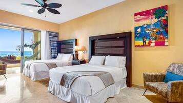 Condo, Multiple Beds, Pool Access, Ocean View (Garza Blanca Preserve Resort 2101 A/B) | 2 bedrooms, individually decorated, individually furnished, bed sheets
