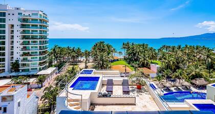 Spacious Condo With Near the Beach With Resort-style Pool, Inviting Balcony