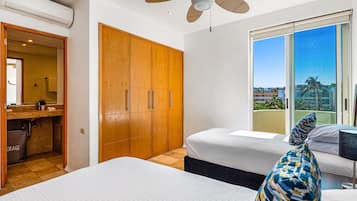 Condo, Multiple Beds, Pool Access, Beach View (Nitta Condo # 408 Penthouse) | 2 bedrooms, individually decorated, individually furnished, bed sheets
