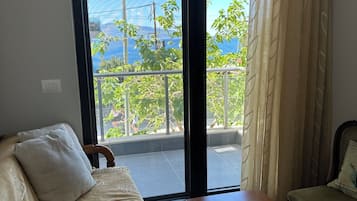 Family Apartment, Balcony, Partial Sea View | Living area