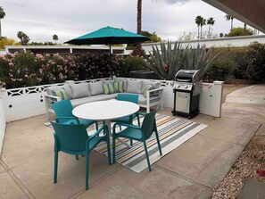 Outdoor dining - Spacious Mid-Century Modern Condo with Patio, Garage, and Resort-Style Amenities (Palm Springs)